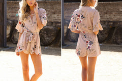 DEEP PLUNGE HALF SLEEVE FLORAL PRINT ROMPER